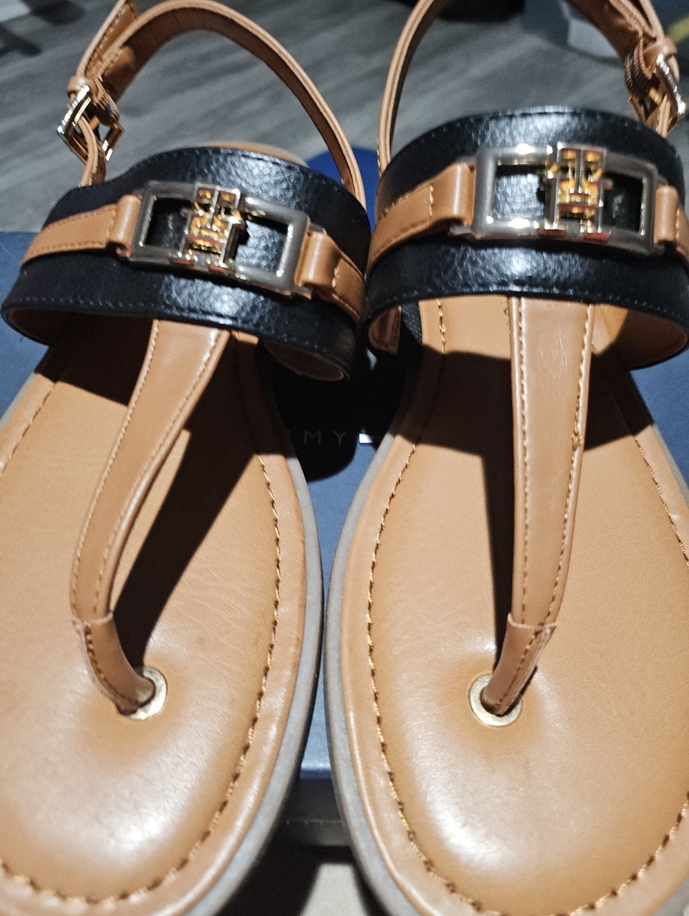 Tommy Hilfiger Tan and Black T-Strap Sandals with Gold Accent